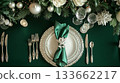 A green tablecloth with a white tablecloth underneath it 133662217