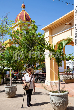 Senior travel. Senior woman at the beautiful heritage town of Mompox wearing the traditional Sombrero vueltiao. 133662370