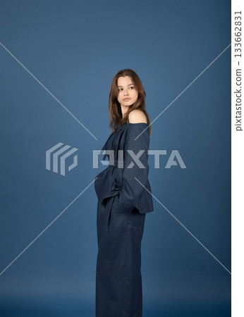 Beautiful woman with blue linen suit studio portrait Beautiful woman with blue linen suit studio portrait 133662831