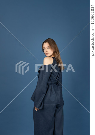 Beautiful woman with blue linen suit studio portrait Beautiful woman with blue linen suit studio portrait 133662834