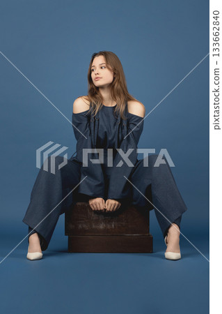 Beautiful woman with blue linen suit studio portrait Beautiful woman with blue linen suit studio portrait 133662840
