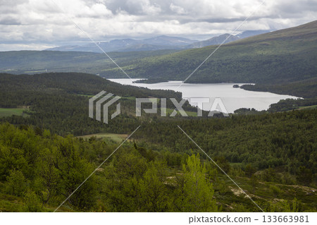 Exploring the scenic beauty of Lake Flatningen from Strondsaeterhoe mountain in Norway's Vang Municipality 133663981