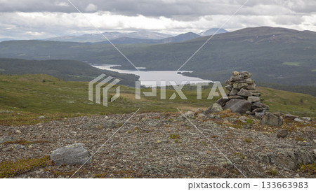 Breathtaking view of Lake Flatningen from the slopes of Strondsaeterhoe mountain in Innlandet County, Norway 133663983