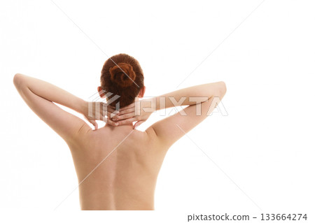 Sitting naked woman in white towel Sitting naked woman in white towel 133664274