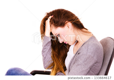 Woman suffering from headache migraine pain Woman suffering from headache migraine pain 133664617