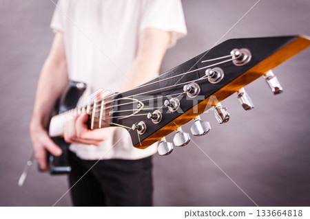Close up on guitar fretboard 133664818