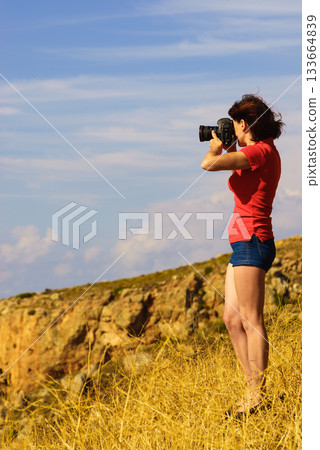 Tourist take photo on nature Mani Greece Tourist take photo on nature Mani Greece 133664839