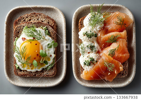 Egg-based breakfast. Smoked salmon and cream cheese on whole-grain toast. Keto friendly breakfast. Menu design. Top view. Egg-based breakfast. Smoked salmon and cream cheese on whole-grain toast. Keto friendly breakfast. Menu design. Top view. 133667938