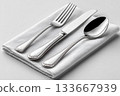 Restaurant promotions. Set for everyday dining, Fork, knife and spoon on a white background. Dining settings. 133667939