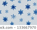 Snowfall art. Seamless pattern in a drawing style. Blue snowflakes equidistant from each other. Minimalist style. 133667970