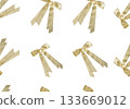 A seamless pattern featuring golden bows with long ribbons on a white background.  133669012