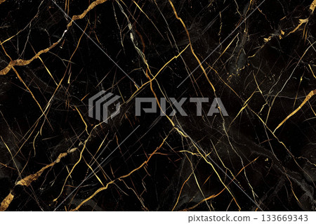 Marble texture with gold lines on a black background 133669343