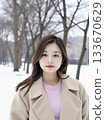 AI-generated image of a young woman in a coat 133670629