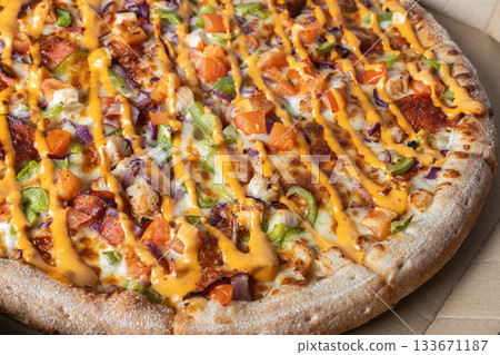 Close-Up of Freshly Baked Pizza with Colorful Toppings Close-Up of Freshly Baked Pizza with Colorful Toppings 133671187