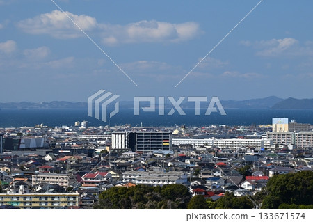 Omura City (Nagasaki Prefecture / after construction of Shin-Omura Station) Hario Radio Tower and Saikai Bridge (Sasebo) in the distance 133671574