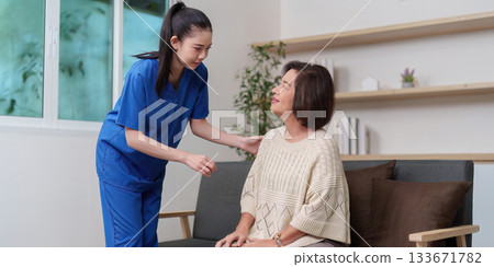 Healthcare. Nurse providing emotional support to elderly patient in home setting. 133671782