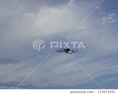 Flying drones and planes 133671842