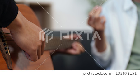 Hobby Family: Playing Guitar and Enjoying Music Hobby Family: Playing Guitar and Enjoying Music 133672151