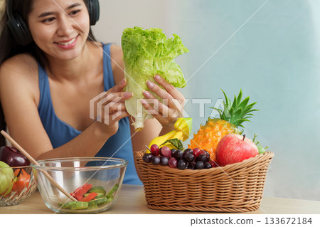Food Wellness: Woman Enjoying Fresh Produce and Healthy Lifestyle 133672184