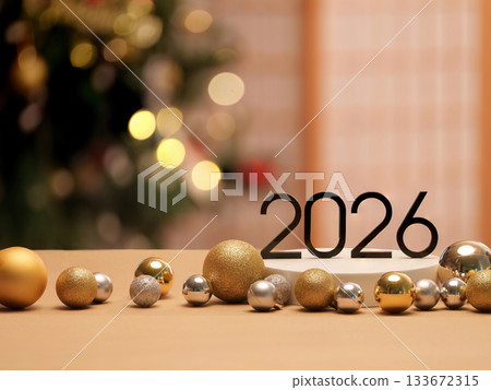 New Year 2026 Celebration with Golden Ornaments and Lights 133672315