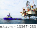 Oil and rig in offshore with sunset and sunrise time. The construction platform for production oil and gas in power and energy industry. 133674233