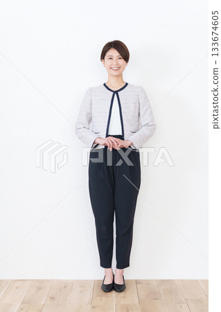 A woman in a formal suit 133674605