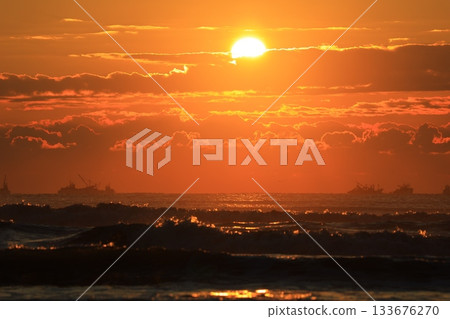 Clouds floating over the sea at sunrise 133676270