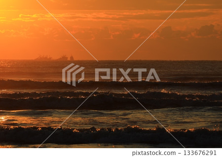 Clouds floating over the sea at sunrise 133676291