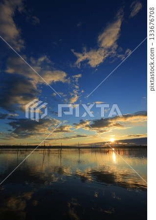 Asahi reflected on the surface of the water 133676708