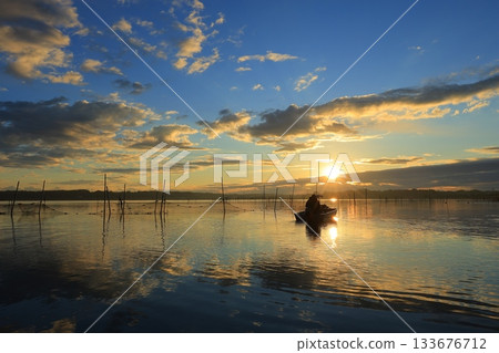 Asahi reflected on the surface of the water Asahi reflected on the surface of the water 133676712