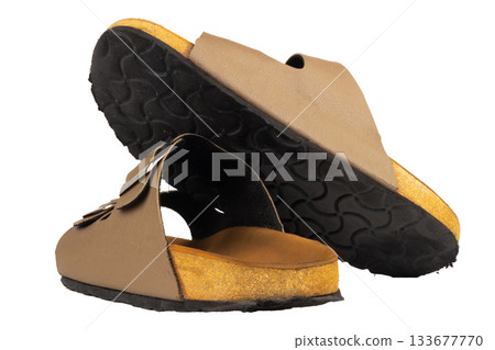 Brown leather sandals on white background 133677770