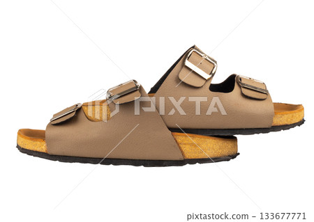 Brown leather sandals on white background 133677771