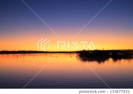 Asahi reflected on the surface of the water Asahi reflected on the surface of the water 133677832