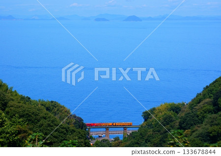 Landscape photo of the Iyonada Sea and a sightseeing train Landscape photo of the Iyonada Sea and a sightseeing train 133678844
