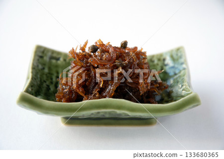 Dried chirimen with Japanese pepper served on a small plate Dried chirimen with Japanese pepper served on a small plate 133680365