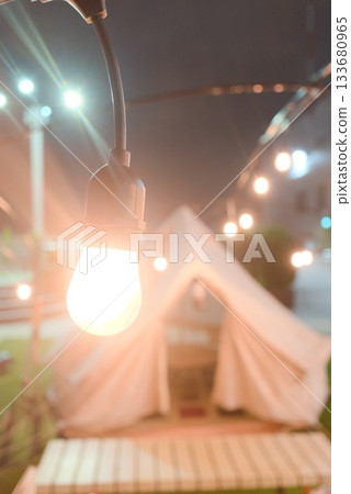 Outdoor beer garden night lights and tent 133680965