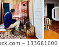 Mature man sits on low stool preparing kindling before brick stove. 133681600