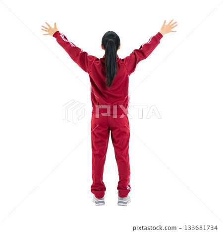 A back view of a female student in a gym jersey raising her arms in a cheer. A transparent, hand-cut, full-body PNG photo. 133681734