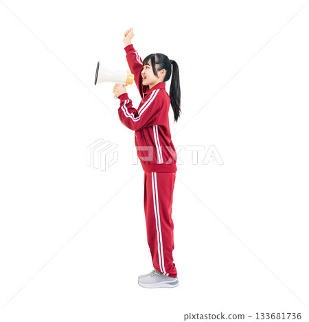 Female student wearing a gym jersey cheering with a loudspeaker. Full-body photo PNG with transparent background, precisely cut out by hand. Female student wearing a gym jersey cheering with a loudspeaker. Full-body photo PNG with transparent background, precisely cut out by hand. 133681736