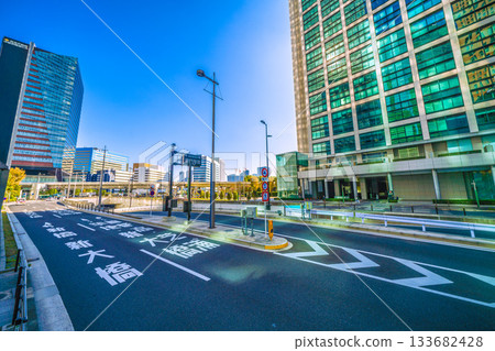 Tokyo cityscape in Japan, including the Conrad Tokyo (Tokyo Shiodome Building) and the buildings of Shiodome reflected in the glass windows 133682428
