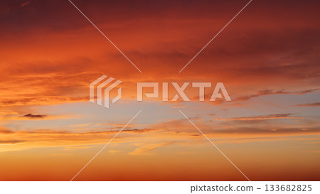 Sunset clouds in the sky in summer evening 133682825