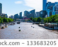 A bridge with Merry Christmas sign over the Yarra River in the business center of Melbourne, Australia. 133683205