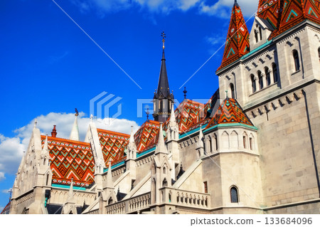 View to Matthias Church in the Castle District. Matthias Church is one of the most famous landmarks of Budapest. View to Matthias Church in the Castle District. Matthias Church is one of the most famous landmarks of Budapest. 133684096