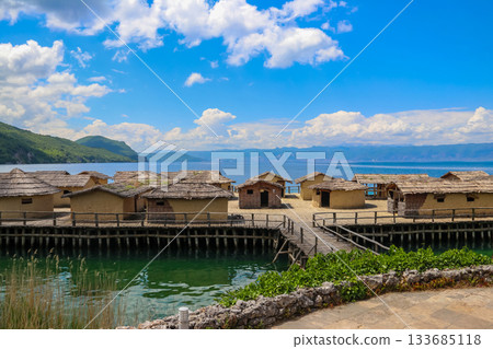 Museum on water, Bay of Bones, prehistoric pile-dwelling, recreation of a bronze age settlement on Lake Ohrid, North Macedonia Museum on water, Bay of Bones, prehistoric pile-dwelling, recreation of a bronze age settlement on Lake Ohrid, North Macedonia 133685118