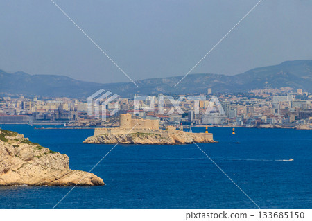 View of the Chateau d'If (If castle) and the town of Marseille from Frioul islands, France 133685150