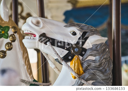 The expressions of the horses on the retro amusement park merry-go-round are funny The expressions of the horses on the retro amusement park merry-go-round are funny 133686133