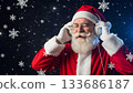Santa Claus listening to music with headphones on a starry background 133686187