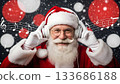 Santa Claus listening to music with headphones, enjoying Christmas melodies 133686188
