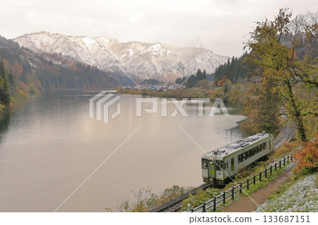 Tadami Line of autumn leaves and snow scene Tadami Line of autumn leaves and snow scene 133687151