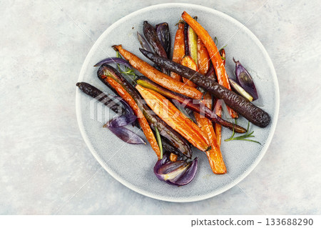 Delicious roasted baby carrots. Delicious roasted baby carrots. 133688290